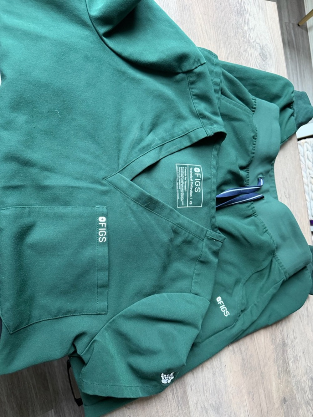 FIGS Women's Scrub Top and Pants Set in Forest Green